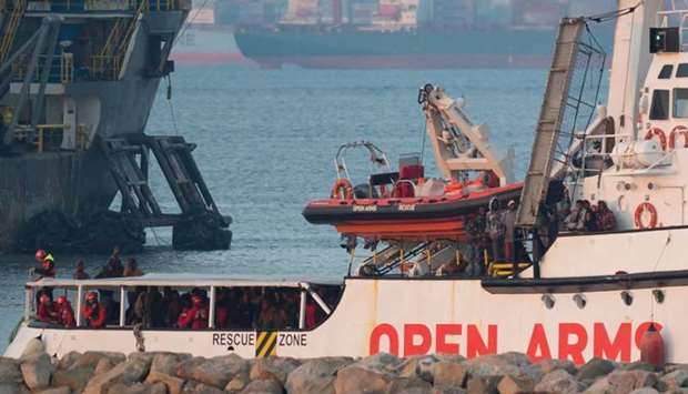 The ship of Spanish NGO Proactiva Open Arms arrives in the southern Spanish port of Algeciras in Campamento near San Roque, with 311 migrants on board on December 28, 2018