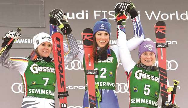 (L to R) Second-placed German Viktoria Rebensburg, first-placed Slovakian Petra Vlhova and third-placed French Tessa Worley pose on the podium after the Womenu2019s Giant Slalom event at the FIS Alpine Skiing World Cup in Semmering, Austria, yesterday. (AFP)