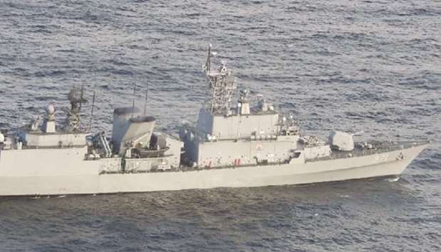 South Korean Navyu2019s Gwanggaeto the Great-class destroyer DDH 971 is seen from Japan Self-Defence Forceu2019s airplane in this photo released by Japanu2019s Ministry of Defense.