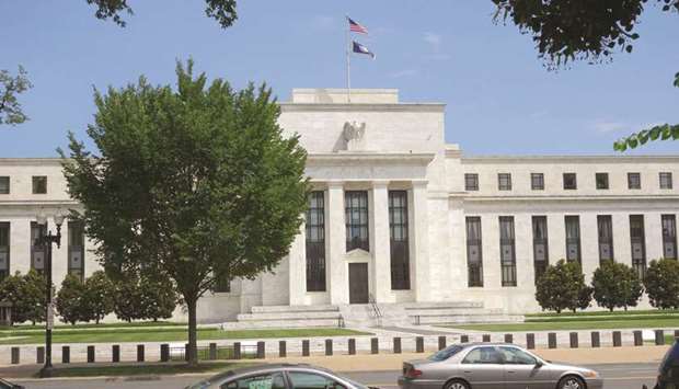 The US Federal Reserve building in Washington, DC (file). The Fed projects two rate increases in 2019 and another move in 2020, based on a confident outlook of continuing solid growth.