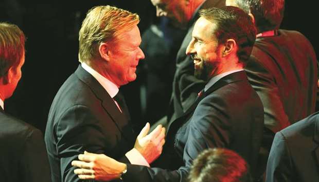 Netherlands coach Ronald Koeman (left) and England manager Gareth Southgate greet each other after the UEFA Euro 2020 qualifying draw in Dublin, Ireland, yesterday. (Reuters)