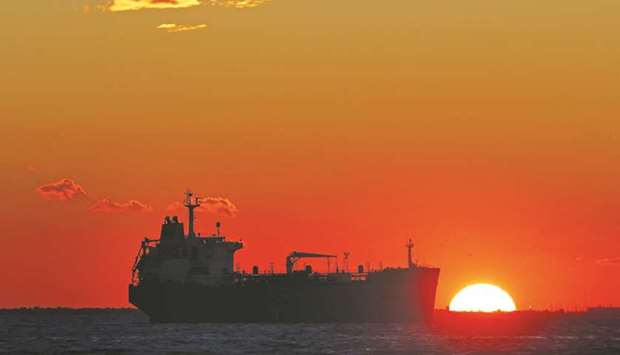 An oil tanker sits anchored off the Fos-Lavera oil hub near Marseille, France (file). Oil prices have fallen more than 40% from multi-year highs reached in early October on concerns about the impact of a trade dispute between the US and China on global economic growth and demand for oil.