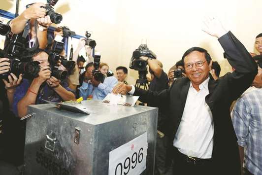 Opposition CNRP president Kem Sokha casts his vote during local elections in Kandal province.