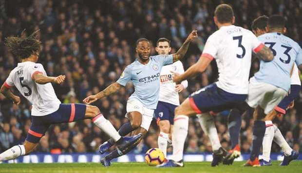 Manchester Cityu2019s Raheem Sterling (right) has recently been rewarded with a new five-year contract, worth a reported u00a3300,000 a week, by the Premier League leaders. (AFP)
