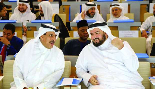 HE the Minister of Awqaf and Islamic Affairs Dr Ghaith bin Mubarak al- Kuwari with HE Sheikh Abdullah at the conference.