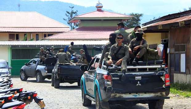 Indonesian Mobile Brigade Police head to Nduga yesterday, where 31 construction workers are believed to have been shot dead, from Wamena