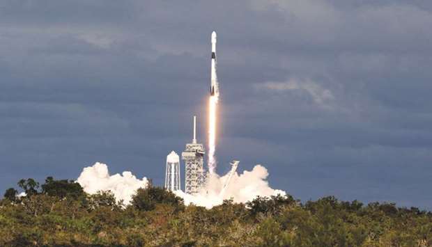 A November 15, 2018, file photo of a SpaceX Falcon 9 rocket launching from the Kennedy Space Center in Cape Canaveral, Florida.