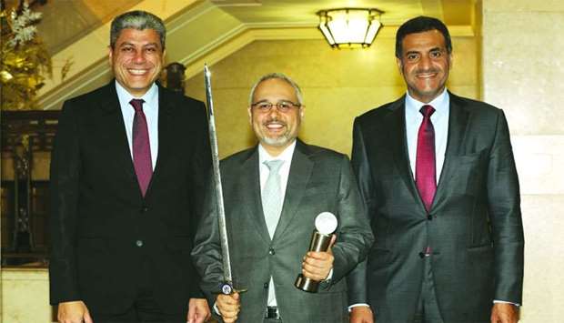 Sheikh Khalid (right) with top Qatargas officials in London after receiving u2018Sword of Honouru2019 and u2018Globe of Honour' awards by the British Safety Council.