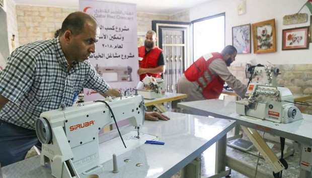 QRCS-funded sewing workshops in Al-Quds.