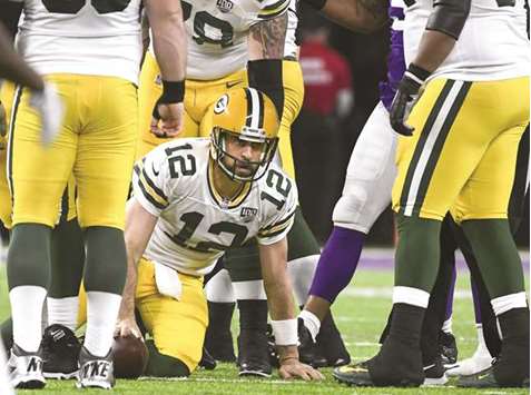 Green Bay Packersu2019 Aaron Rodgers gets up after being sacked by the Minnesota Vikings in the second half of the NFL game in Minneapolis, Minnesota. (EPA)