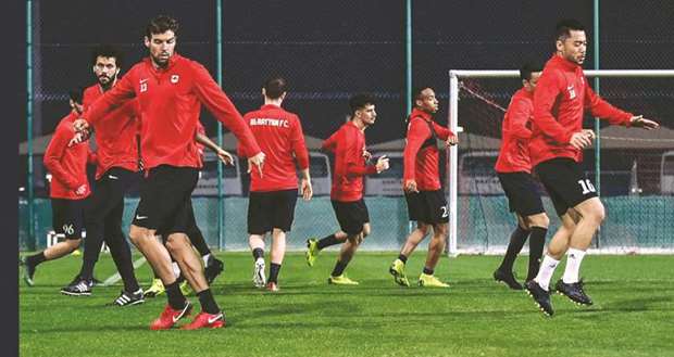 Al Rayyan players train yesterday ahead of their QNB Stars League match against Al Kharaitiyat.