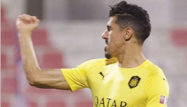 Al Saddu2019s Baghdad Bounedjah exults after scoring against Shahania yesterday.