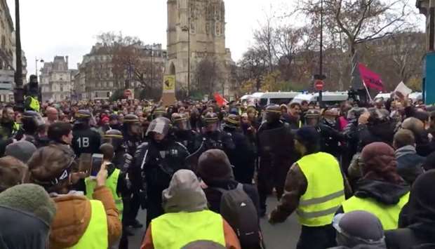 French CRS riot police clash with protesters in Paris, France