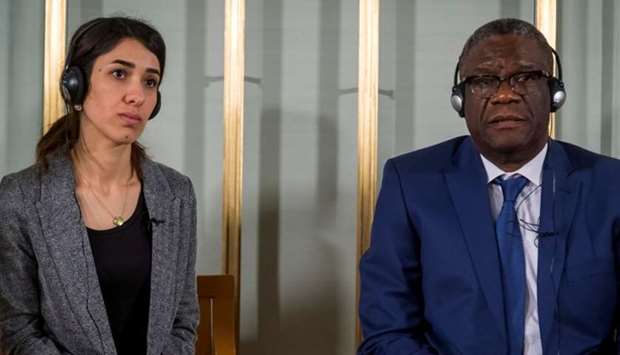 Nobel peace prize laureates Nadia Murad and Denis Mukwege attend a news conference at the Nobel Institute in Oslo, Norway.