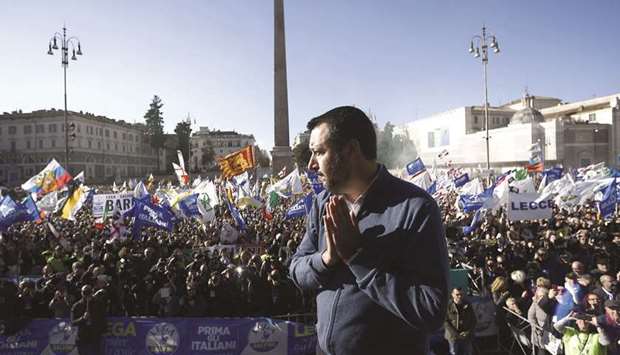 Salvini acknowledges supporters at the Piazza del Popolo in Rome.