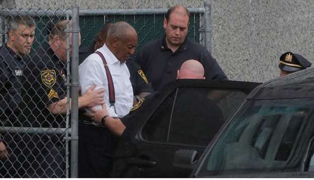 Actor and comedian Bill Cosby leaves the Montgomery County Courthouse in handcuffs after sentencing in his sexual assault trial in Norristown, Pennsylvania, US on September 25, 2018