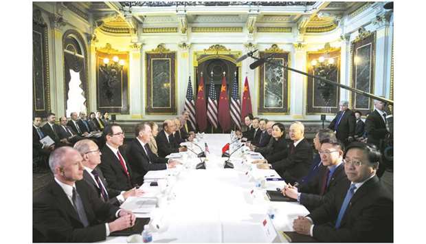Robert Lighthizer, US Trade Representative (centre left), meets with Liu He, Chinau2019s Vice Premier and director of the central leading group of the Chinese Communist Party (centre right), during trade talks between the US and China in the Eisenhower Executive Office Building in Washington (file). Chinese officials expect the US will delay a threatened tariff increase set for Sunday as both sides focus on de-escalating tensions by cutting import taxes currently in place rather than removing specific products from the target list, according to sources.