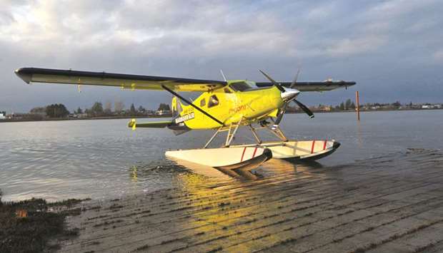 Harbour Air Pilot and CEO Greg McDougall flies the worldu2019s first all-electric, zero-emission commercial aircraft during a test flight in a de Havilland DHC-2 Beaver from Vancouver International Airportu2019s South Terminal on the Fraser River in Richmond, British Columbia, Canada