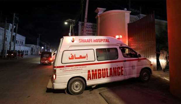 Ambulance carrying an injured person from an attack by Al Shabaab gunmen on a hotel near the presidential residence arrives to the Shaafi hospital in Mogadishu