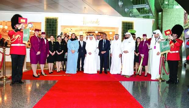 HE Sheikha Al Mayassa bint Hamad al-Thani and HE Akbar al-Baker with other dignitaries and officials at the official opening of the Harrods Tea Room at HIA.