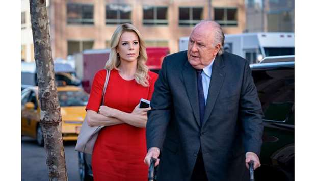 ACTION: Charlize Theron as Megyn Kelly and John Lithgow as Roger Ailes in Bombshell.