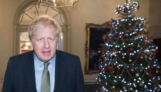 Britain's Prime Minister Boris Johnson leaves Downing Street in London on December 13, 2019 for Buckingham Palace where he is expected to see Queen Elizabeth II and be invited to form a Government after securing a majority in the general election