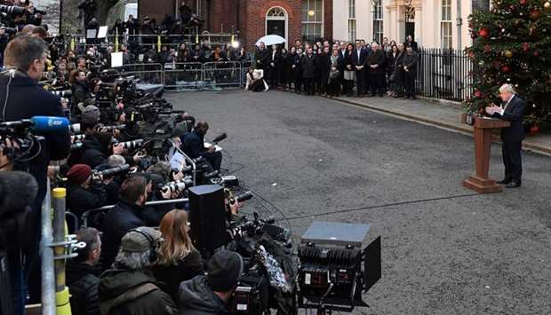 Britain's Prime Minister Boris Johnson delivers a speech outside 10 Downing Street in central London