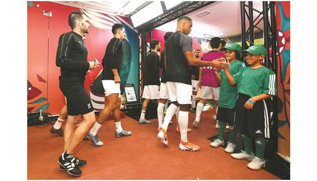 Wanda guests (right) watch Al Sadd players leave the tunnel prior to the FIFA Club World Cup Qatar 2019 match at Jassim Bin Hamad Stadium on Wednesday. (FIFA)