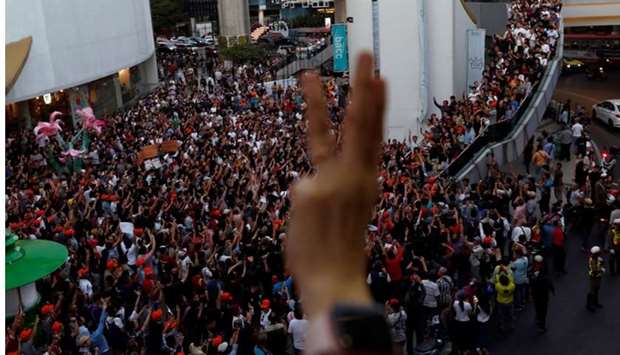 Supporters react at a sudden unauthorised rally by the progressive Future Forward Party in Bangkok, Thailand