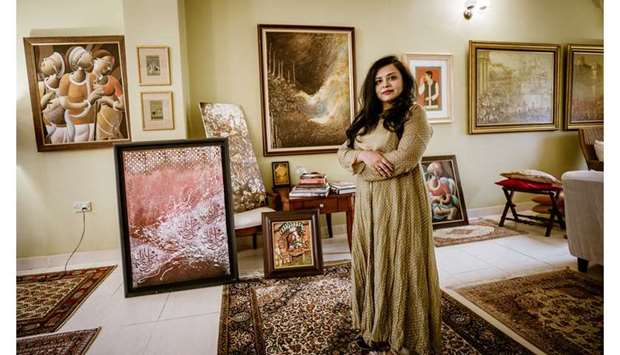 COLLECTION OF THE BEST: The works of some of the best-known artists from India and Qatar line the walls of both floors of Sujata Varmau2019s home.