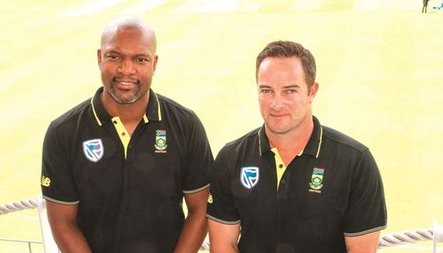The South African Cricket coach Mark Boucher (right) and assistant coach Enoch Nkwe pose at the Newlands Cricket grounds in Newlands yesterday. (AFP)