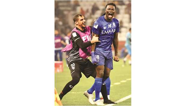 Al Hilalu2019s Bafetimbi Gomis (right) celebrates his goal during the FIFA Club World Cup match against Esperance Sportive de Tunis at Jassim Bin Hamad Stadium in Doha yesterday. PICTURE: Noushad Thekkayil