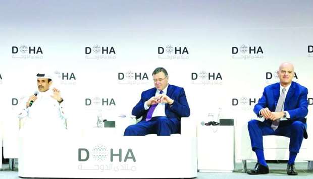 HE al-Kaabi with Pouyannu00e9 and Descalzi at a panel discussion at the Doha Forum 2019.