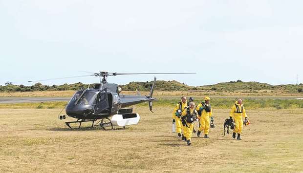 New Zealand Police Search and Rescue and Disaster Victim Identification staff return to Whakatane Airport after conducting a search for bodies in the aftermath of the eruption of White Island volcano, which is also known by its Maori name Whakaari, yesterday.