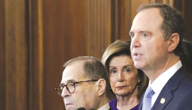 This file picture taken on Tuesday shows Speaker of the House Nancy Pelosi with Schiff (right) and Nadler.