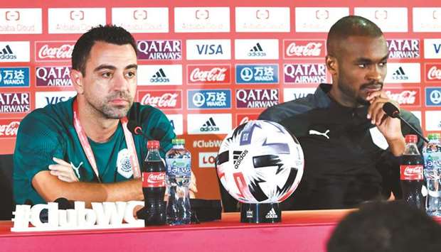 Al Sadd coach Xavi (left) and player Abdelkarim Hassan address a press conference yesterday. PICTURES: Noushad Thekkayil