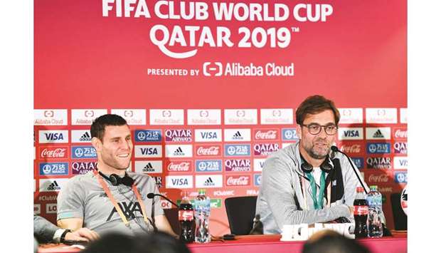 Liverpool manager Jurgen Klopp (right) speaks at a press conference as player James Milner looks on on the eve of the semi-final against Monterrey in Doha. (Below) Monterreyu2019s coach Antonio Mohamed (left) speaks to the media. PICTURES: Noushad Thekkayil
