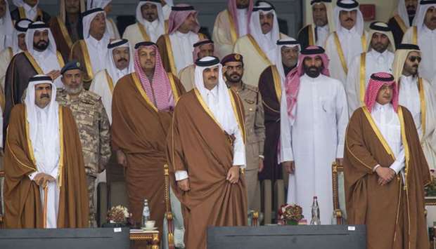 His Highness the Amir Sheikh Tamim bin Hamad Al-Thani and His Highness the Father Amir Sheikh Hamad bin Khalifa Al-Thani attend the 2019 Qatar National Day Parade