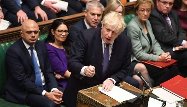 A handout photograph released by the UK Parliament shows Britain's Prime Minister Boris Johnson speaking at the opening of the Second Reading of the European Union (Withdrawal Agreement) ,Brexit, Bill in the House of Commons in London