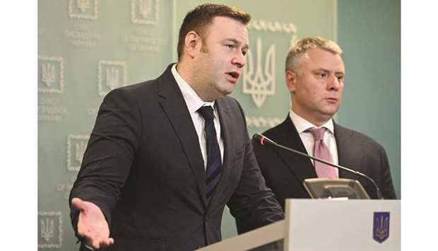 Ukraineu2019s Energy Minister Oleksiy Orzhel (left) and Ukraineu2019s state-run energy company Naftogaz CEO Yuriy Vitrenko attend a press conference in Kiev yesterday. Russian energy giant Gazprom has agreed to pay $2,9bn to its Ukrainian counterpart Naftogaz to settle a long-running dispute over transit fees for gas transported to Europe.