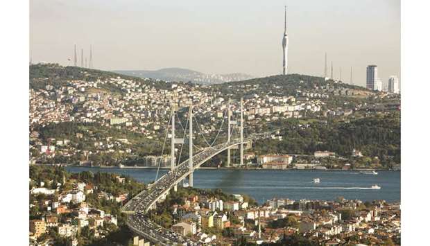 Traffic passes along a road bridge across the Bosporus in Istanbul (file). Turkeyu2019s economy grew 0.9% year-on-year in the third quarter, breaking three consecutive quarters of contraction as it shook off a recession which followed last yearu2019s currency crisis.