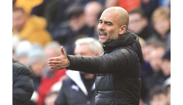 Manchester Cityu2019s Spanish manager Pep Guardiola reacts during the EPL match against Newcastle United on Saturday. (AFP)