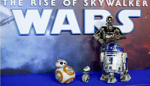 Star Wars robots R2-D2 and BB8 and droids C3P0 and D-0 pose as they attend the premiere of ,Star Wars: The Rise of Skywalker,