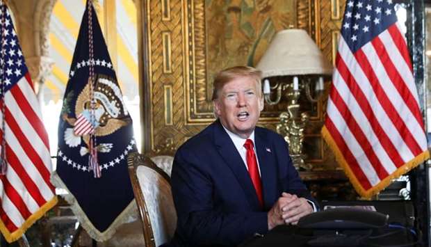 US President Donald Trump speaks to the media after participating in a video teleconference with members of the US military at Trump's Mar-a-Lago resort in Palm Beach, Florida