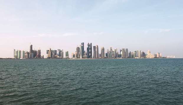 City skyscrapers stand on the skyline in Doha. In its latest overview on Qatar, EIU said the threat of capital outflows in the wake of the blockade on Qatar, imposed in June 2017 by a quartet of Arab countries, has u201clargely subsided with the recovery and subsequent stabilisation of foreign reserves and the return to a current-account surplus in 2017.u201d