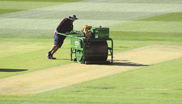 Melbourne Cricket Ground (MCG) head curator Matt Page rolls the wicket ahead of the second cricket Test match between Australia and New Zealand starting today.