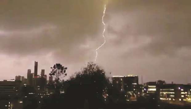 Lightning strikes during a thunderstorm in Brisbane, Queensland, Australia, yesterday.