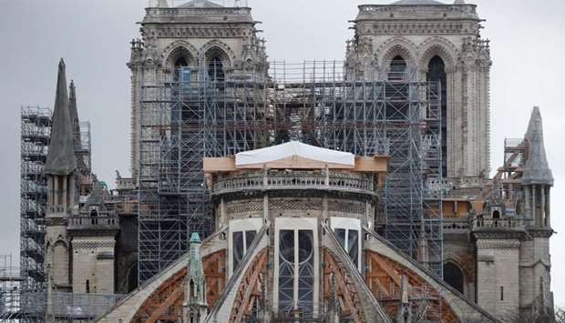 General view shows the Notre Dame Cathedral, as works continue to stabilise the cathedral's structure nine months after a fire caused significant damage, in Paris, France