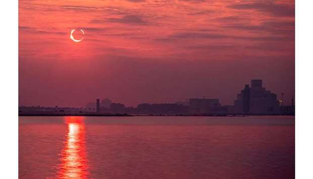 SOLAR ECLIPSE: For many people in Qatar, the solar eclipse was a life time opportunity to witness the celestial occurrence. ttttttt             Photo by Shahin Olakara