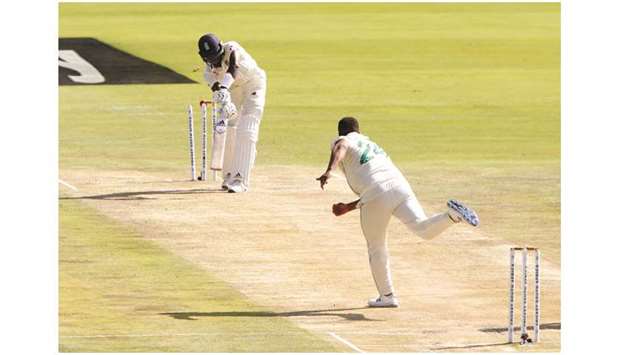 Englandu2019s Jofra Archer (left) is bowled out by South Africau2019s Vernon Philander (also inset) on second day of the first Test at Centurion, South Africa, yesterday. (Reuters/AFP)